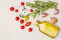 Cooking food background. Fresh rosemary, garlic clove, olive oil, black pepper Royalty Free Stock Photo