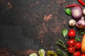 Cooking food background. Fresh vegetables, mushrooms, spices and herbs on black stone table. Top view. Keto diet Royalty Free Stock Photo