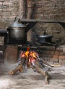 Black pot on a wood fire stove