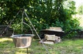 Cooking food on fire. Cooking outdoors in cast-iron cauldron. Royalty Free Stock Photo