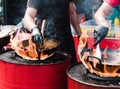 Cooking food in pans at a street festival Royalty Free Stock Photo