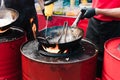 Cooking food in pans at a street festival Royalty Free Stock Photo