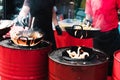 Cooking food in pans at a street festival Royalty Free Stock Photo