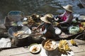 Cooking food to order at the Damnoen Saduak Floating Market about 60 miles from Bangkok Thailand