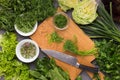 Cooking fresh detox salad on kitchen table