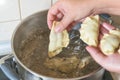 Cooking fresh dumplings with cherry filling Royalty Free Stock Photo