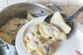 Cooking fresh dumplings with cherry filling Royalty Free Stock Photo