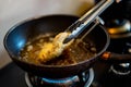 Cooking fried Japanese pork Tonkatsu homemade cutlet, during cook on heat oil on pan.