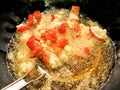 Cooking fried lobster in boiling oil