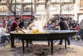 Cooking a giant Paella, traditional Valencian food