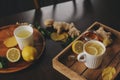 Cooking ginger, lemon and honey hot tea at home. Royalty Free Stock Photo