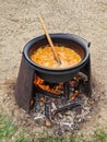 Cooking gulas in a cauldron Royalty Free Stock Photo