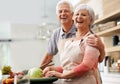 Cooking, health and portrait of old couple in kitchen for salad, love and nutrition. Happy, smile and retirement with Royalty Free Stock Photo