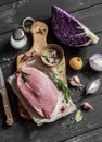 Cooking healthy food - meat, red cabbage, spices and herbs. Raw ingredients. Royalty Free Stock Photo