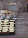 Cooking homemade dumplings.In the kitchen, there is a cutting Board, ready-made dumplings with ingredients for making dough and Royalty Free Stock Photo