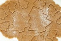 Cooking homemade Gingerbread Cookies. New Year figures from dough, prepared for baking in oven Royalty Free Stock Photo