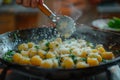 Cooking a homemade gnocchi with sage butter and parmesan