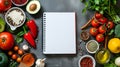 Cooking inspiration with fresh produce and a notebook, perfect for jotting down vibrant, flavorful recipes