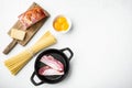 Cooking italian food collage. Ingredients for carbonara pasta, spaghetti, oil, ham, egg and parmesan, on white stone  surface, top Royalty Free Stock Photo