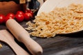 cooking italian pasta by hand kitchen cherry tomatoes ingredients lunch