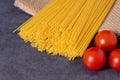 Cooking Italian pasta with tomatoes concept. Royalty Free Stock Photo