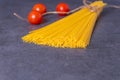 Cooking Italian pasta with tomatoes concept. Royalty Free Stock Photo