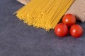 Cooking Italian pasta with tomatoes concept. Royalty Free Stock Photo