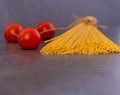 Cooking Italian pasta with tomatoes concept. Royalty Free Stock Photo