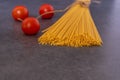 Cooking Italian pasta with tomatoes concept. Royalty Free Stock Photo