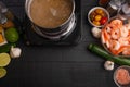 Cooking Italian pasta with vegetable sauce and seafood, shrimp. Background, top view with space for an inscription. Culinary Royalty Free Stock Photo