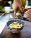 Cooking japanese katsudon rice with green sauce, japanese food
