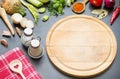 Cooking in the kitchen food background concept with spices vegetables and cutting board