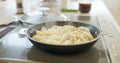 Cooking, kitchen and Japanese dumplings in pot on heat stove for lunch, meal preparation and dinner. Food, cuisine and Royalty Free Stock Photo