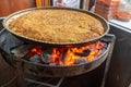 Cooking Kunefe over coals