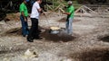 Cooking a local dish Cozido das Furnas in the hot ground, Sao Miguel, Azores, Portugal