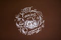 Cooking with love, inscription in chalk on a brown wall, kitchen drawing, kitchen