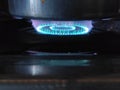 Cooking with lpg gas stove flame in burner Royalty Free Stock Photo