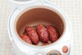 Cooking meatballs in Multicooker Royalty Free Stock Photo