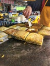 Cooking murtabak at the local stall in Malaysia.