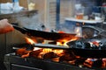 Cooking mussels in a frying pan Royalty Free Stock Photo