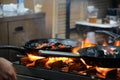 Cooking mussels in a frying pan Royalty Free Stock Photo