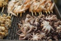 Cooking octopus and other seafood on a barbecue