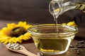 Cooking oil pouring from bottle, Sunflower seed oil, Kitchen preparing Royalty Free Stock Photo