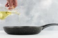 Cooking oil pouring from bottle, Sunflower seed oil, Kitchen preparing Royalty Free Stock Photo