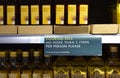 A cooking oil section in a British supermarket with a sign advising each customer can only buy 2 items