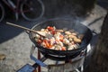 Cooking outdoors on a camping kitchen Royalty Free Stock Photo