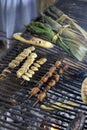 Cooking palm grubs, Kichwa community of Sani Isla in the Ecuadorean Amazon