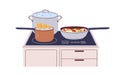 Cooking pans, pots on electric cooker. Stockpot with boiling water, skillet with stewing vegetables, saucepan with pasta