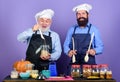 Cooking with passion. Healthy food cooking. mature senior bearded men in kitchen. Halloween recipe. cereals and