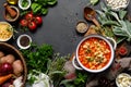 Cooking pasta e fagioli soup with chicken meat and vegetables, italian cuisine Royalty Free Stock Photo